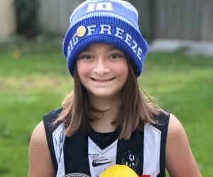 Hope Blythe in her Collingwood supporter top.